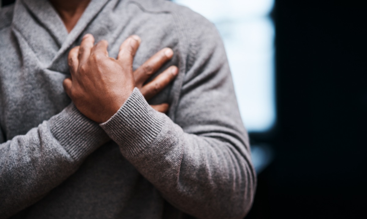 Patient with chest pain, a common reason to see a cardiologist in Cypress, TX