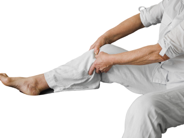 Patient holding painful leg